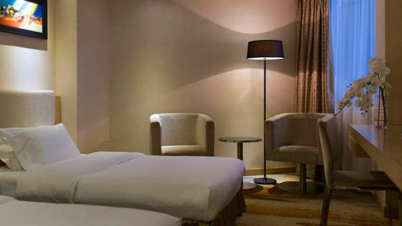Wanxing Hotel Chao Yang Square Branch Наньнин Экстерьер фото