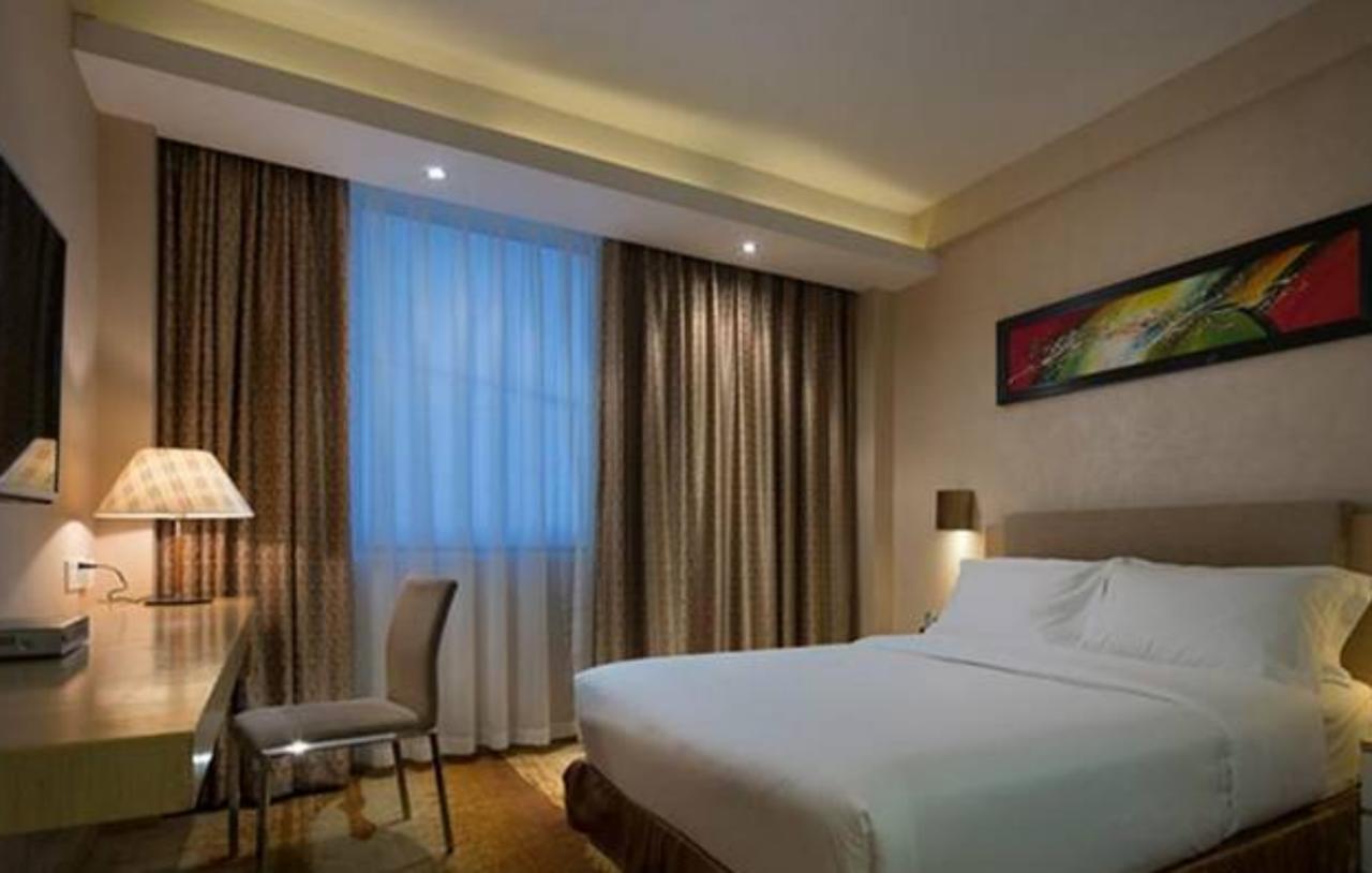 Wanxing Hotel Chao Yang Square Branch Наньнин Экстерьер фото