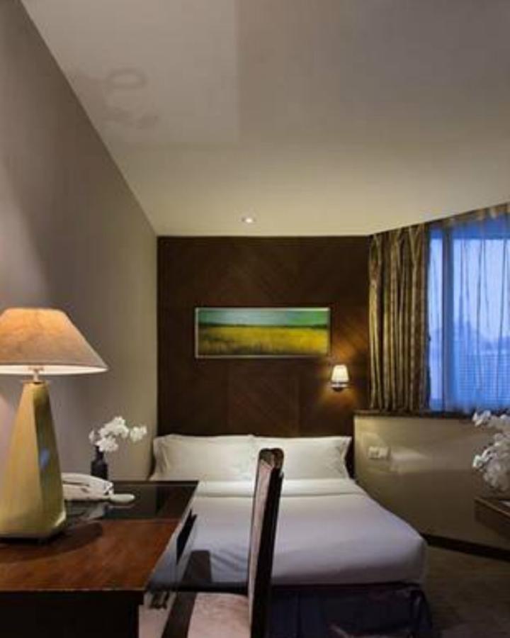 Wanxing Hotel Chao Yang Square Branch Наньнин Экстерьер фото